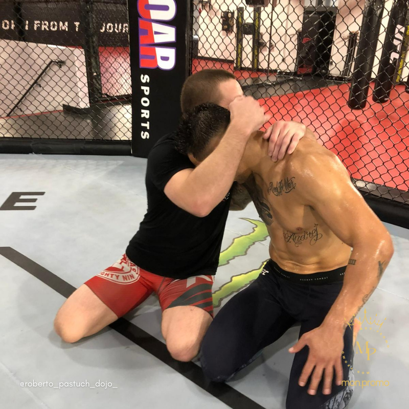 Roberto pastuch hugging Aleksandar Rakić after training